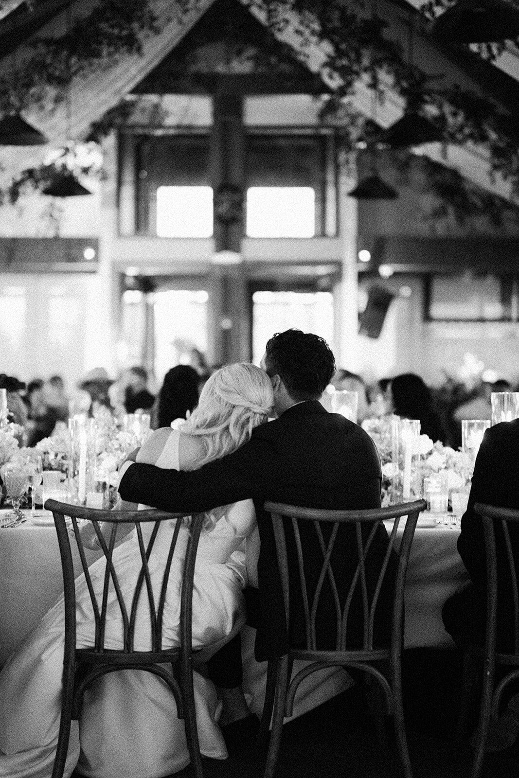 sitting-toether-black-and-white-photo-aspen-HBICWeddings
