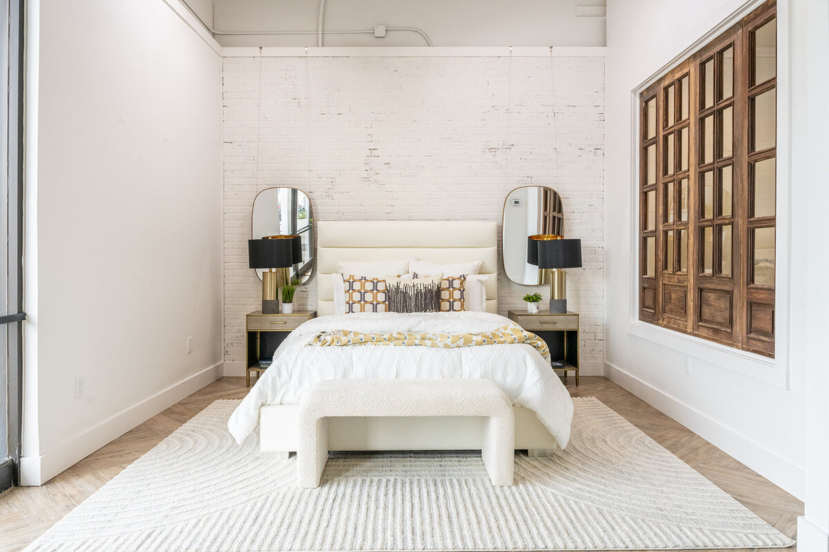 Bedroom with white, black and gold accents