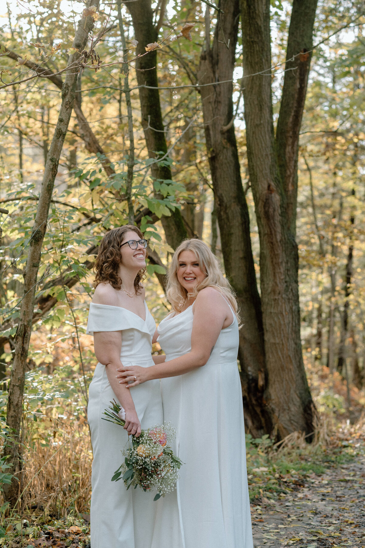 brides happy the sun is coming out on their wedding day