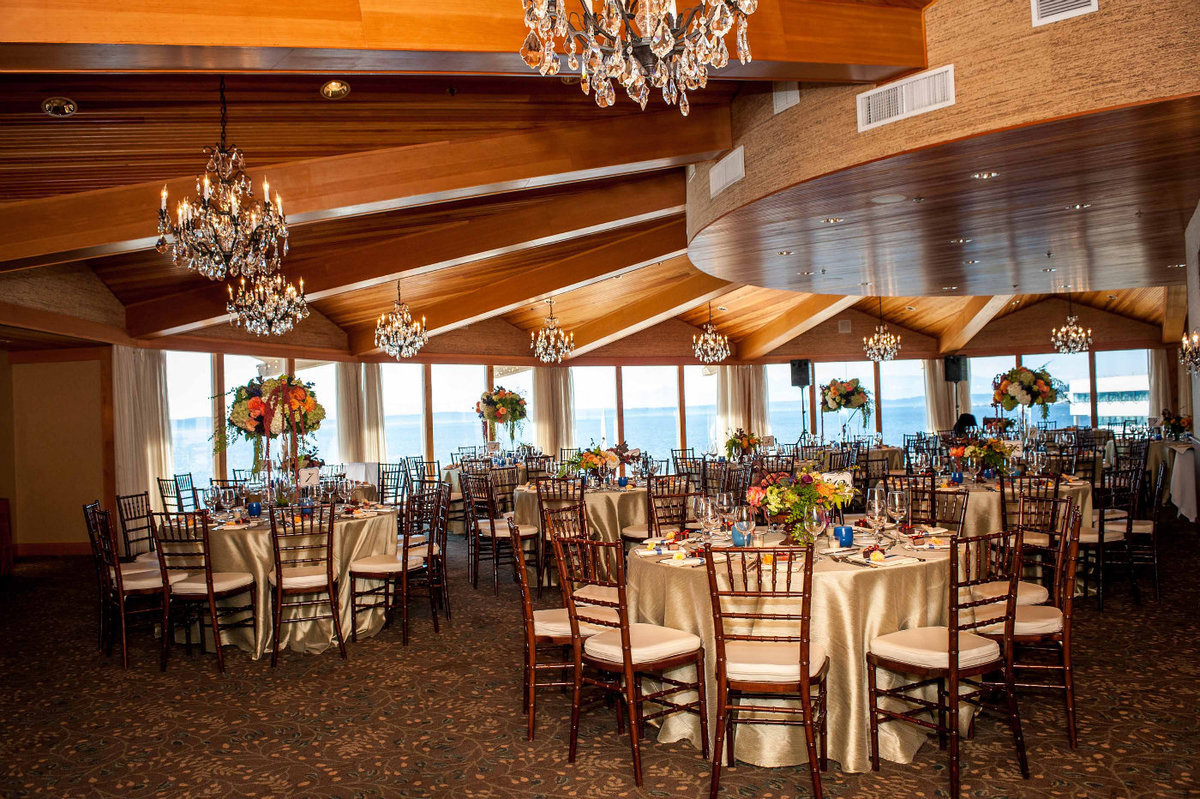 fall wedding reception at Edgewater Hotel Seattle with brown Chivari chairs
