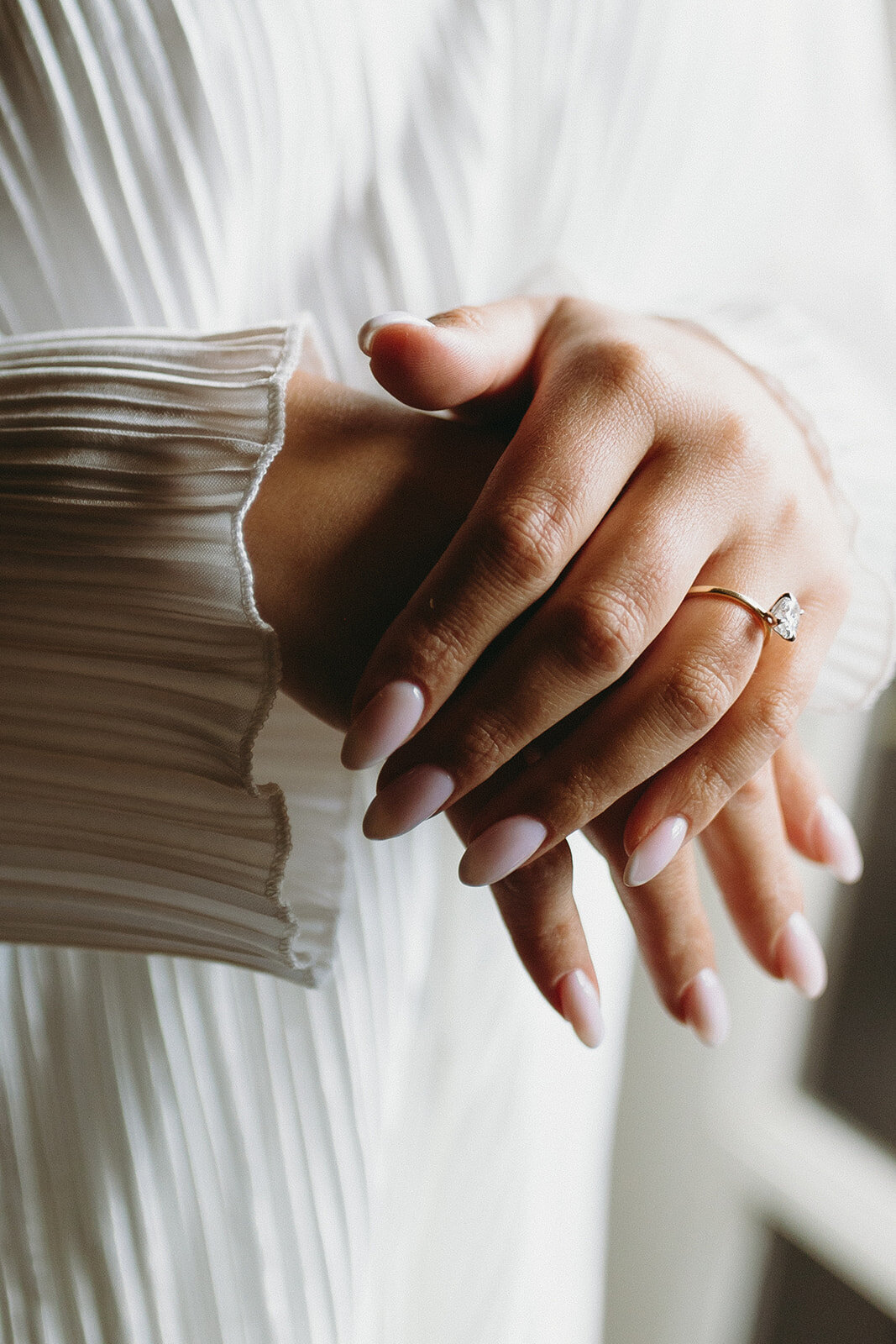 brides-hands-with-engagement-ring-detail-shot-connecticut-wedding