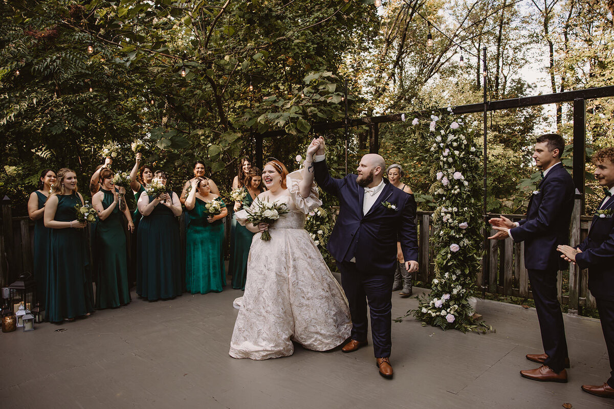 Newlyweds celebrating after their wedding ceremony 