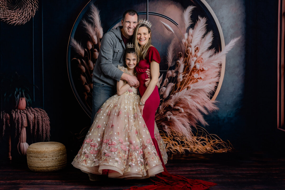 Elegant family poses in Prescott family photography studio with Melissa Byrne