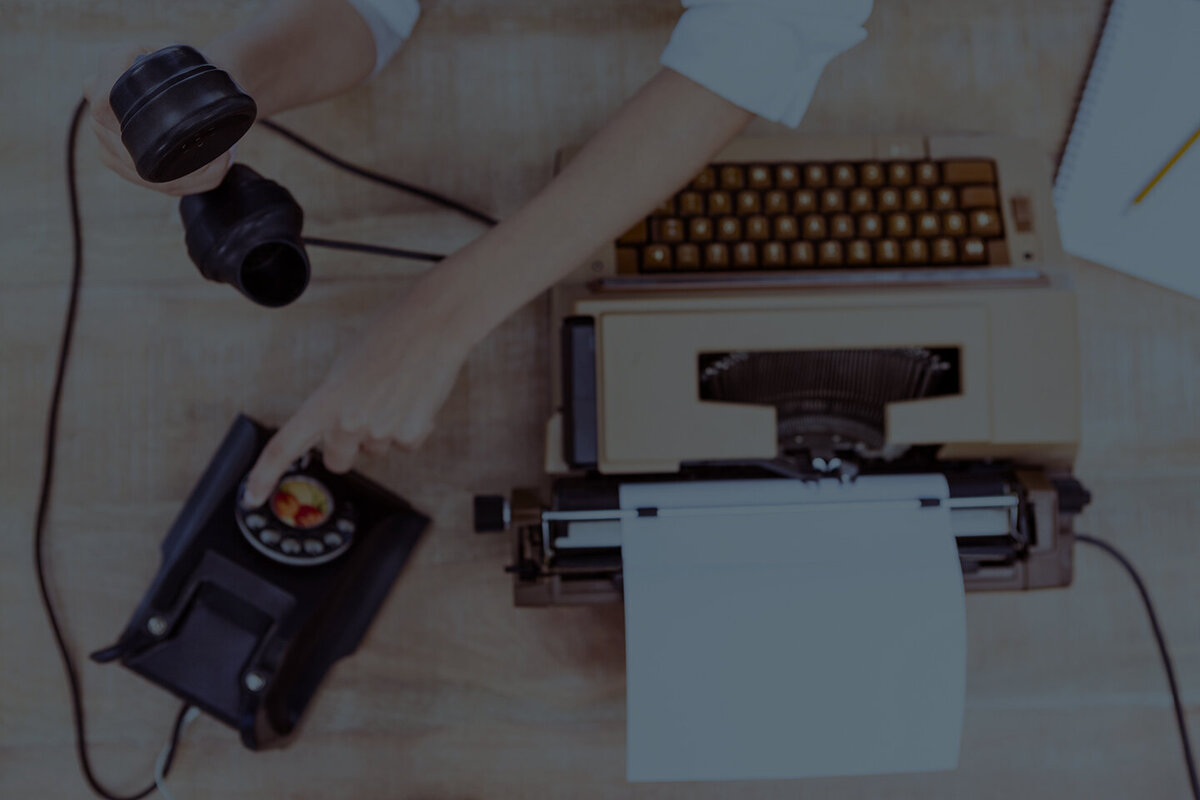 Vintage phone and typewriter in the background with client notes as amanda newman design testimonials