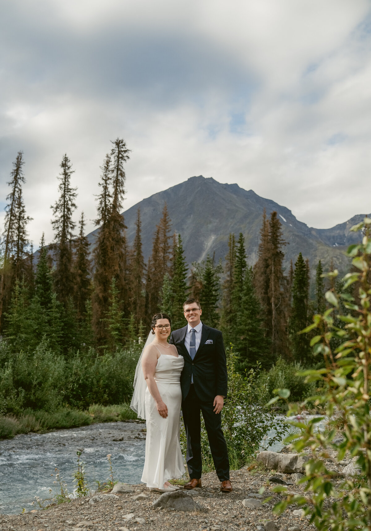 A bride and groom at their elopement in Denali