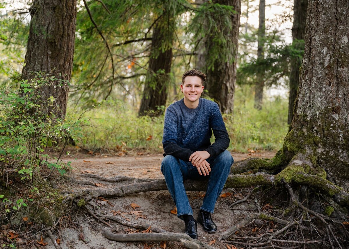 north bend tanner landing guy sitting in forest
