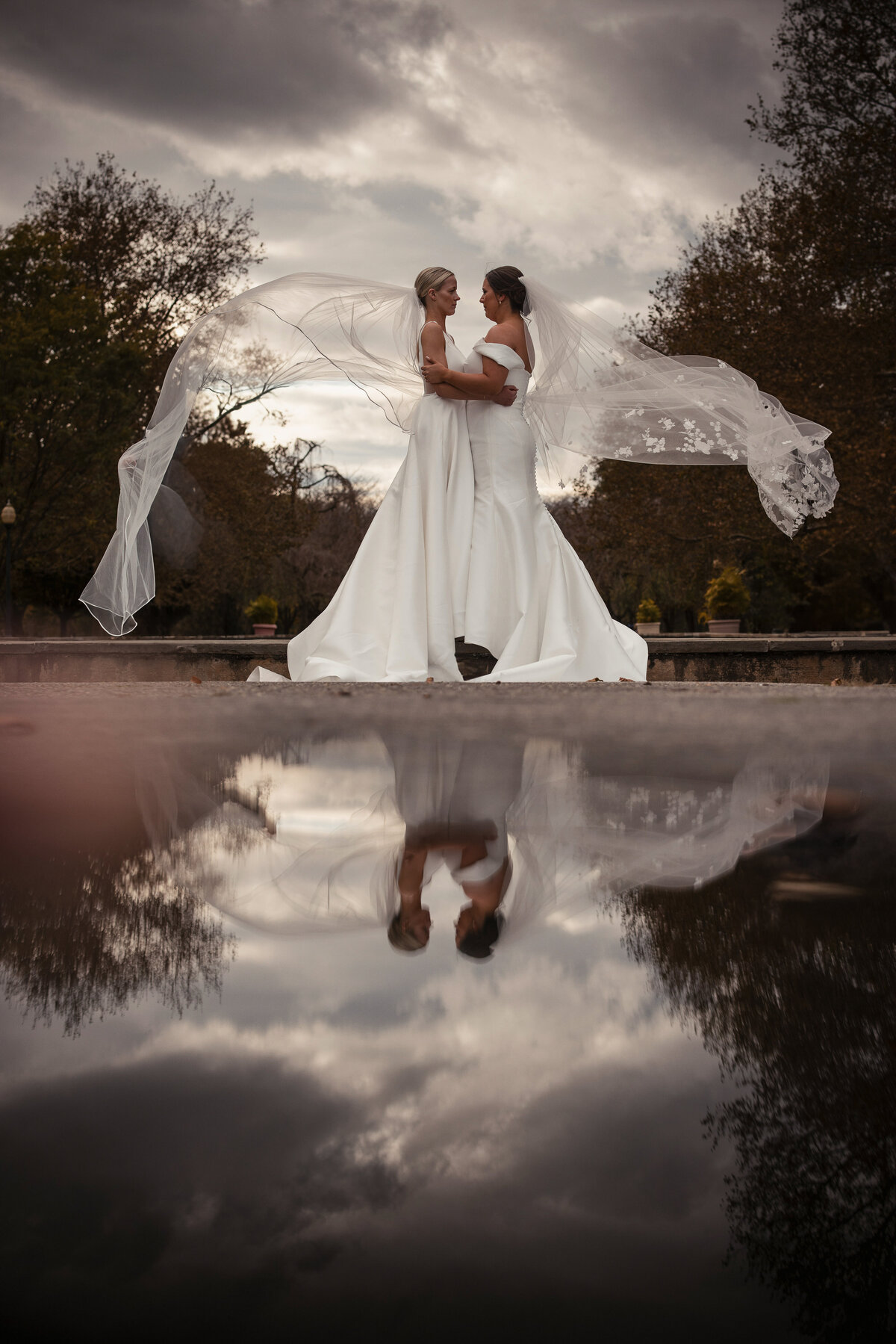 Wedding photos by the fountain at a  Fairmount Park Horticulture Center wedding
