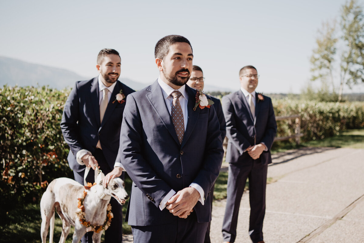Photographers Jackson Hole capture groom watching bride walk down aisle