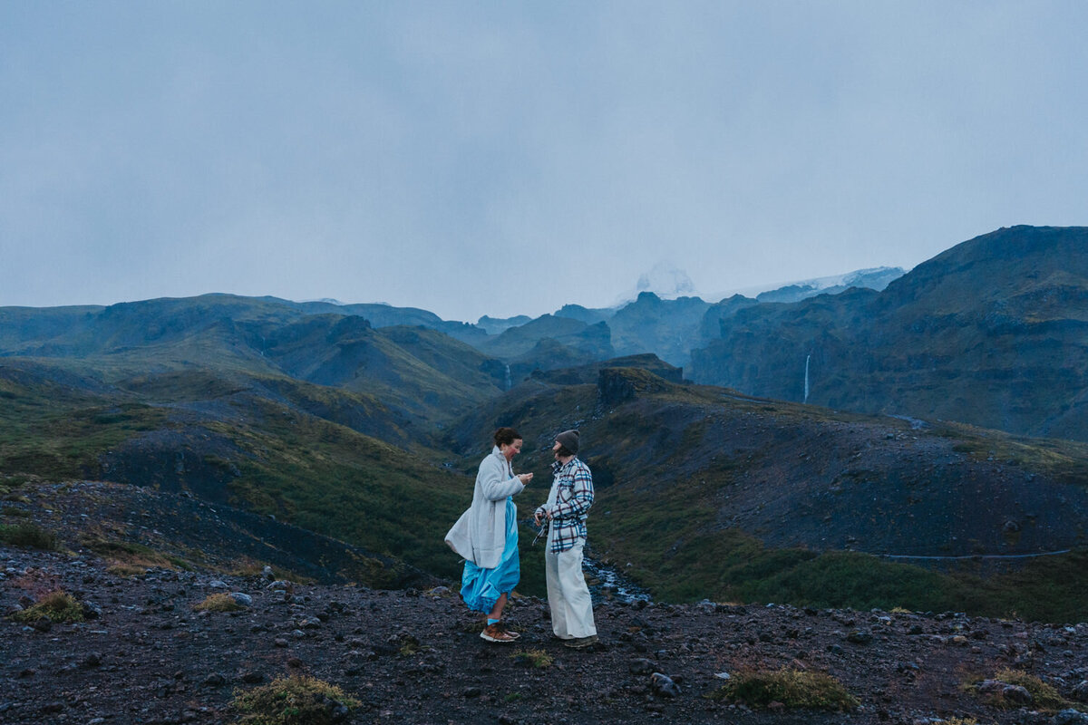 Women talk to each other during their LGBTQ Iceland elopement 