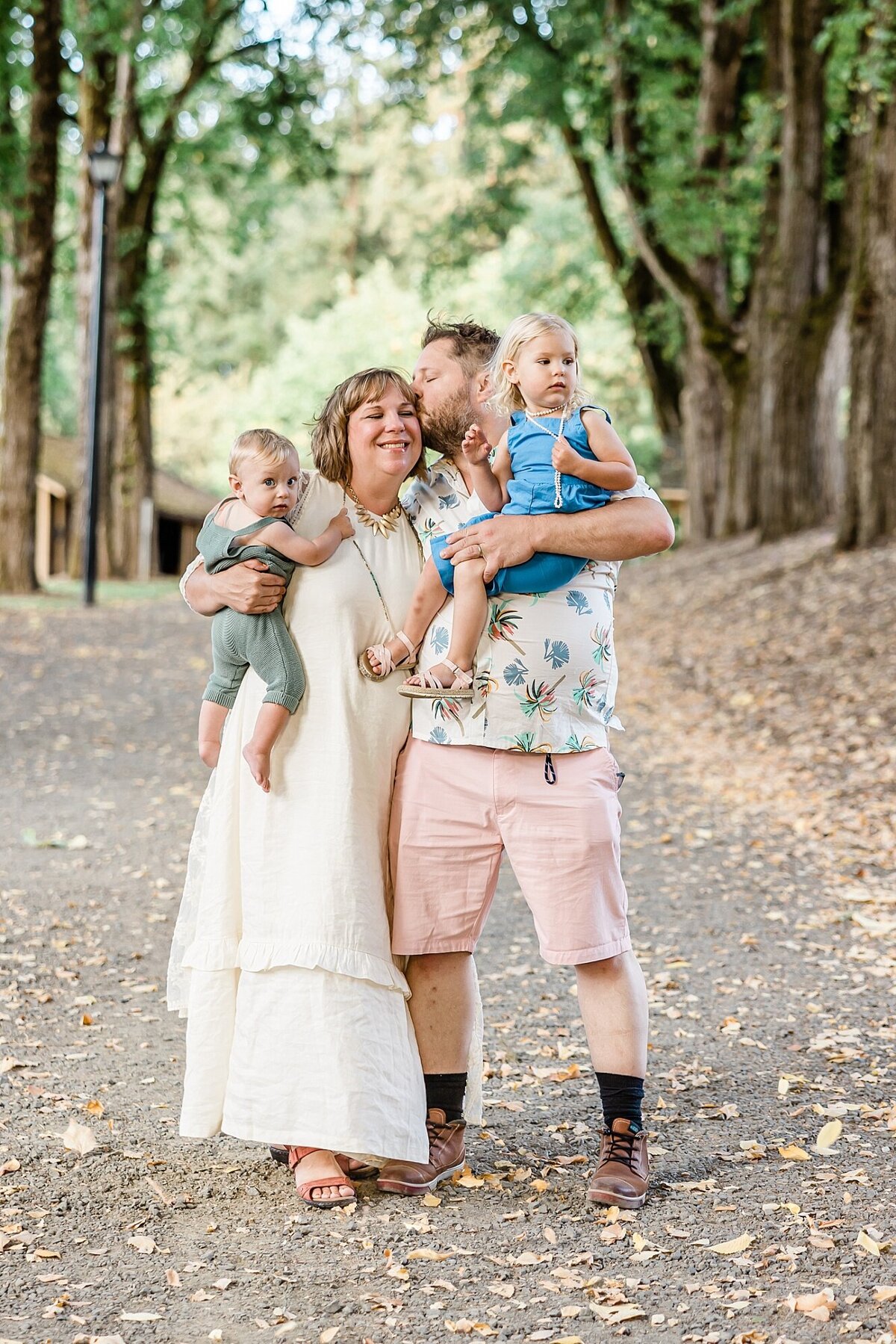 Parents holding kids in outdoor family  photos near  Portland Oregon