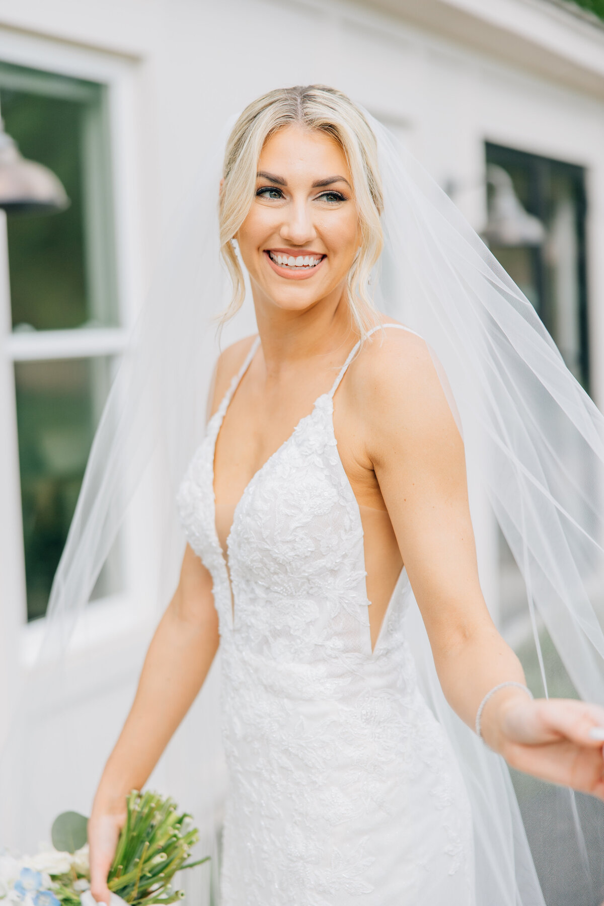 Bride smiling with veil