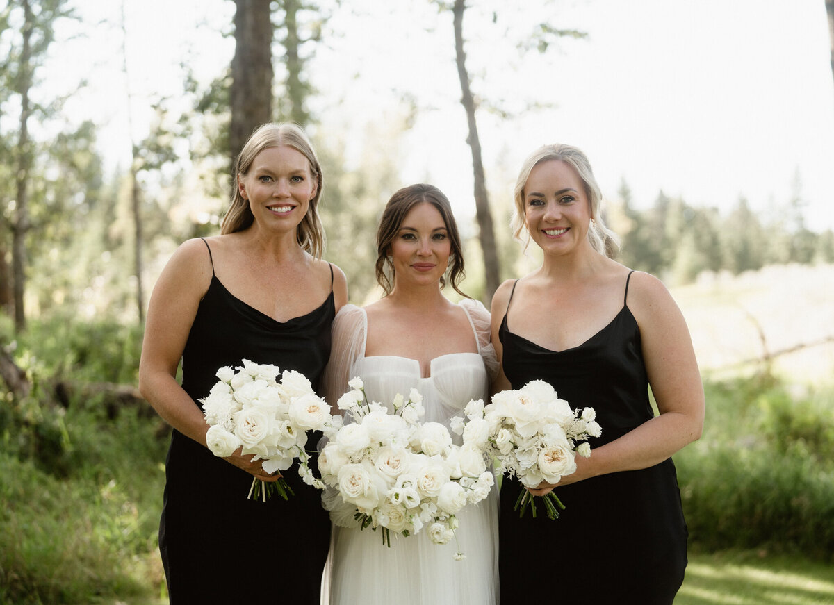 Gorgeous white bridal bouquets by Calyx Floral Design, an innovative Red Deer, Alberta wedding florist, featured on the Brontë Bride Vendor Guide.