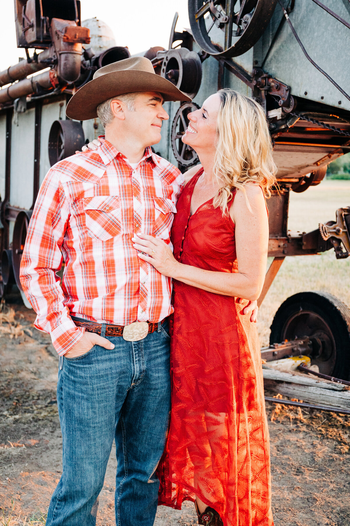 Couple embracing for engagement photo at Travelers Rest State Park in Lolo, MT