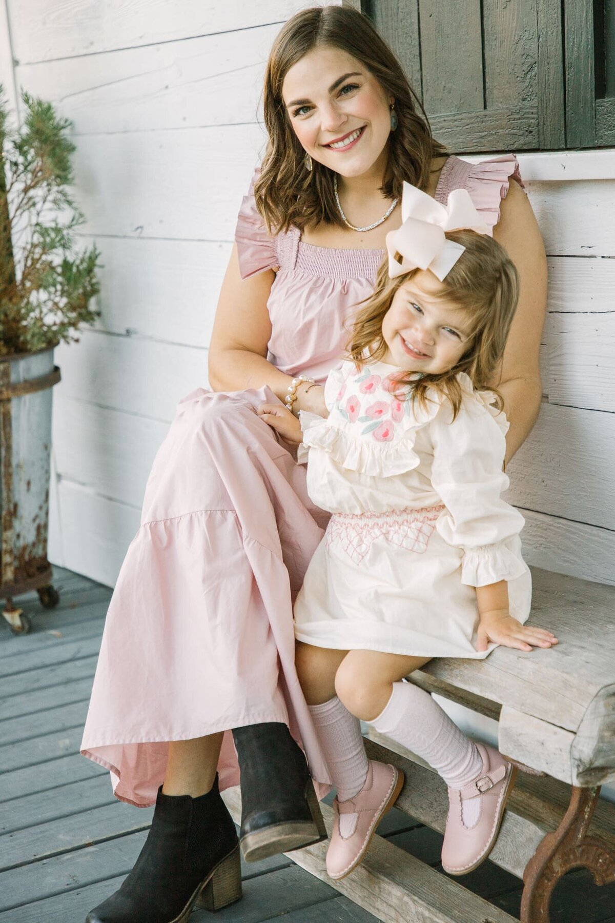 Mother and daughter in pretty dresses