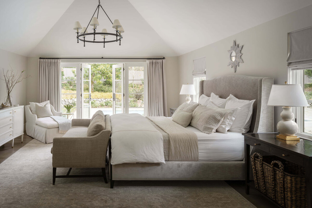 9-neurtral-bedroom-chandelier-chaise-sofa-end-of-bed