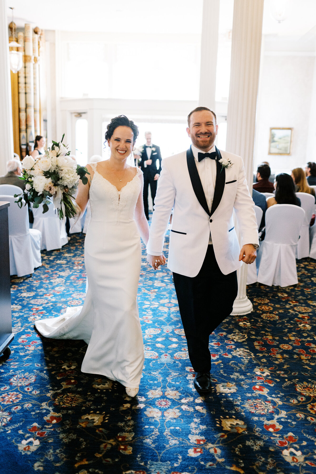 Newlyweds just married exiting with big joy