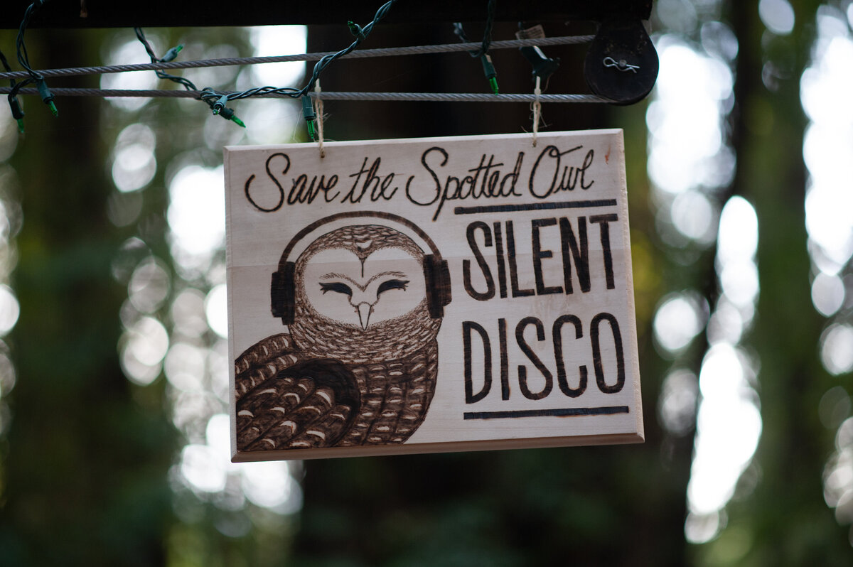 Custom wood sign alerting guests to need for quiet at Pamplin Grove redwood wedding