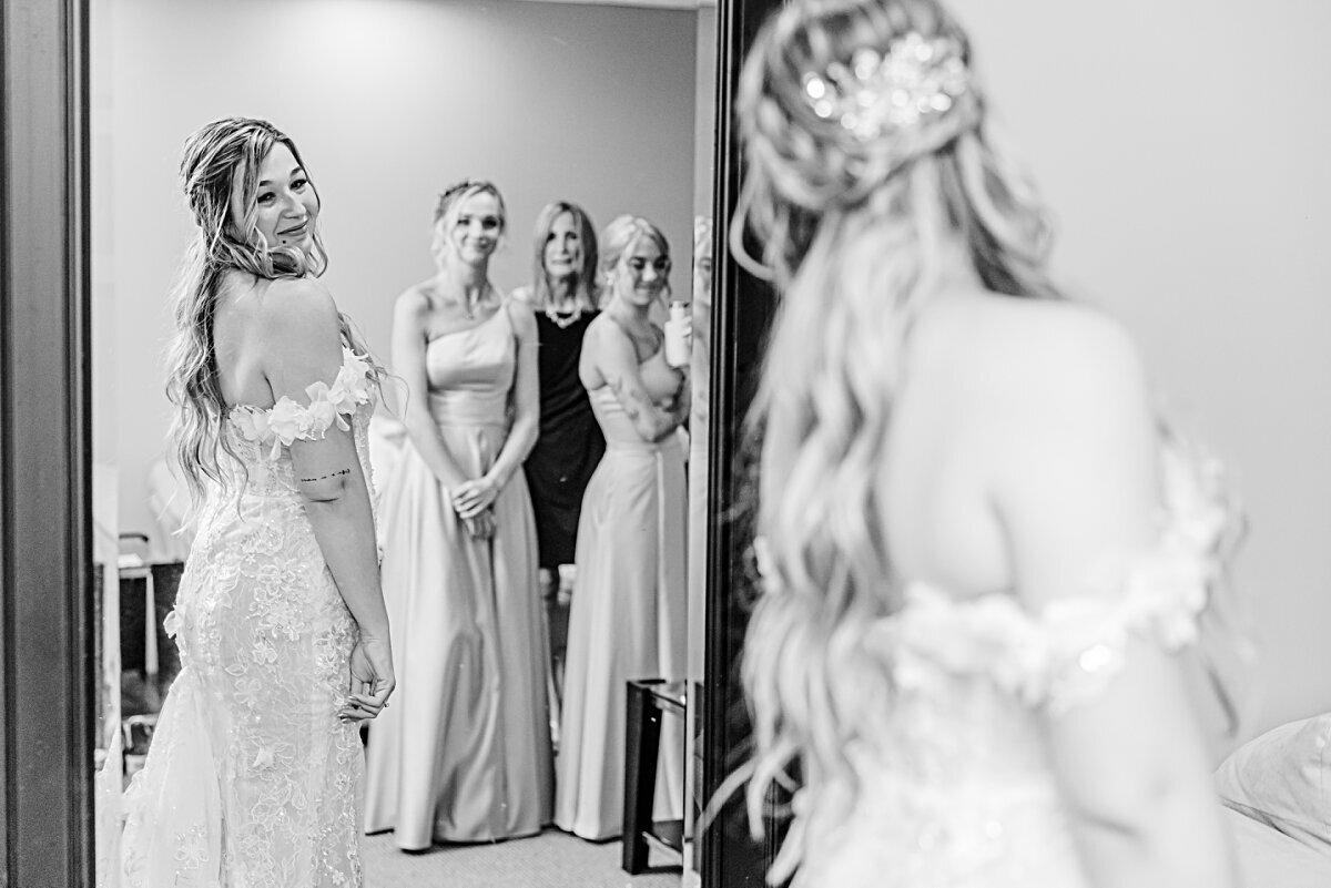 bride-looking-over-her-shoulder-into-mirror