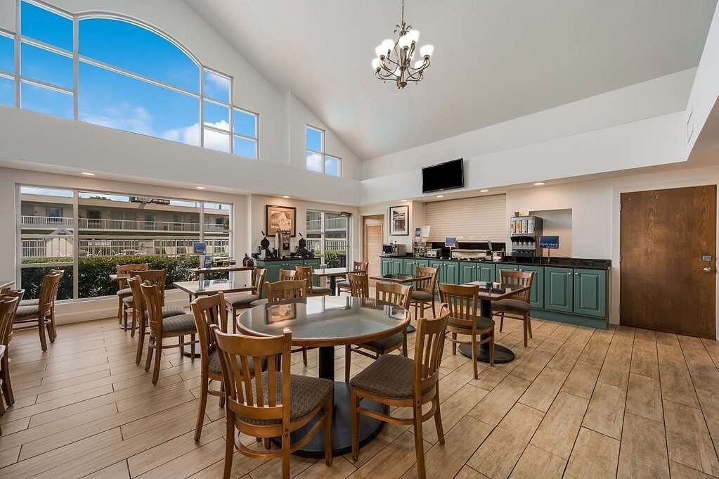 Hotel breakfast area dining area with large window