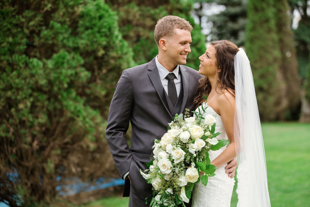photo of bride and groom smiling and looking at each other from wedding at The Carltun
