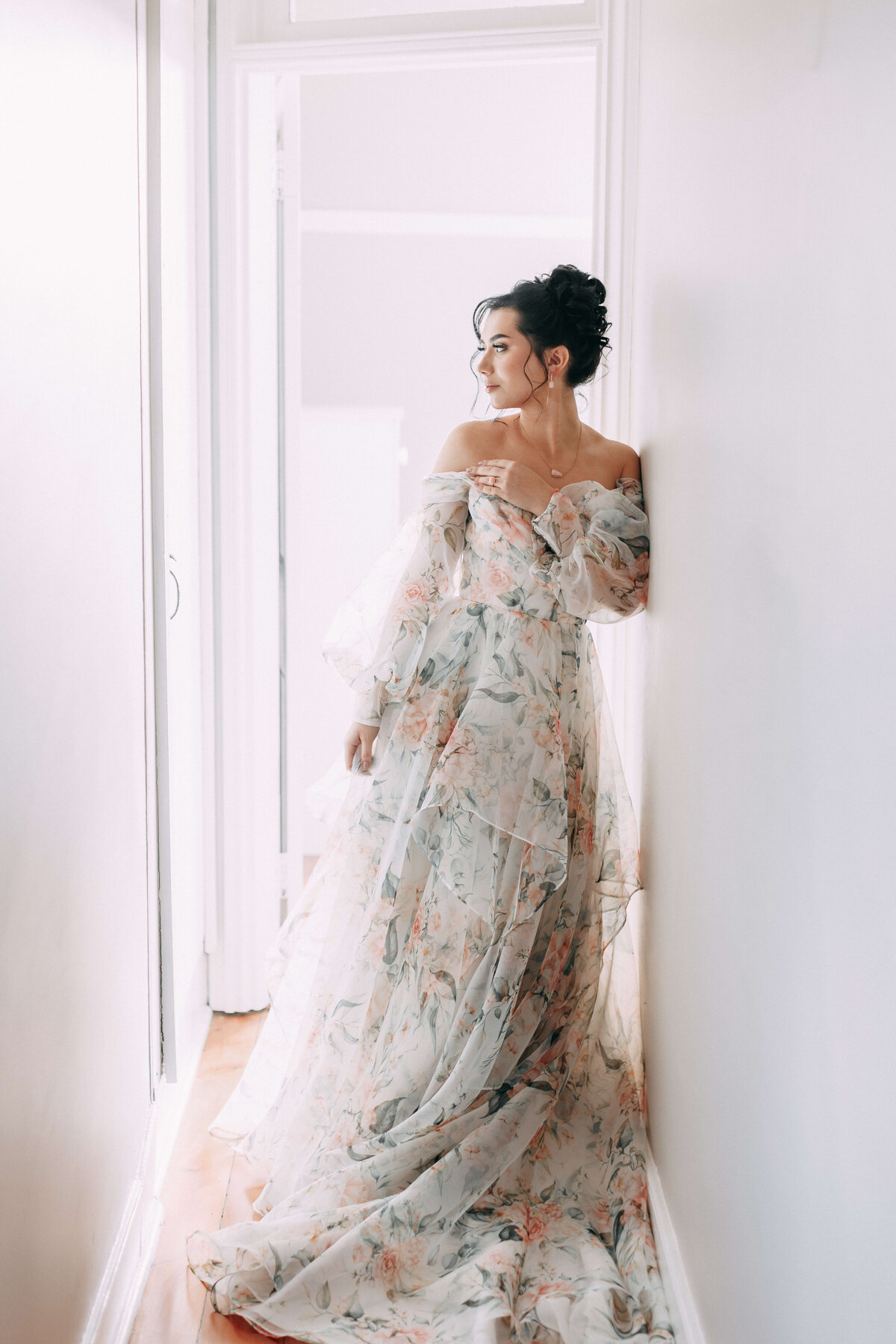 bride wearing floral wedding dress