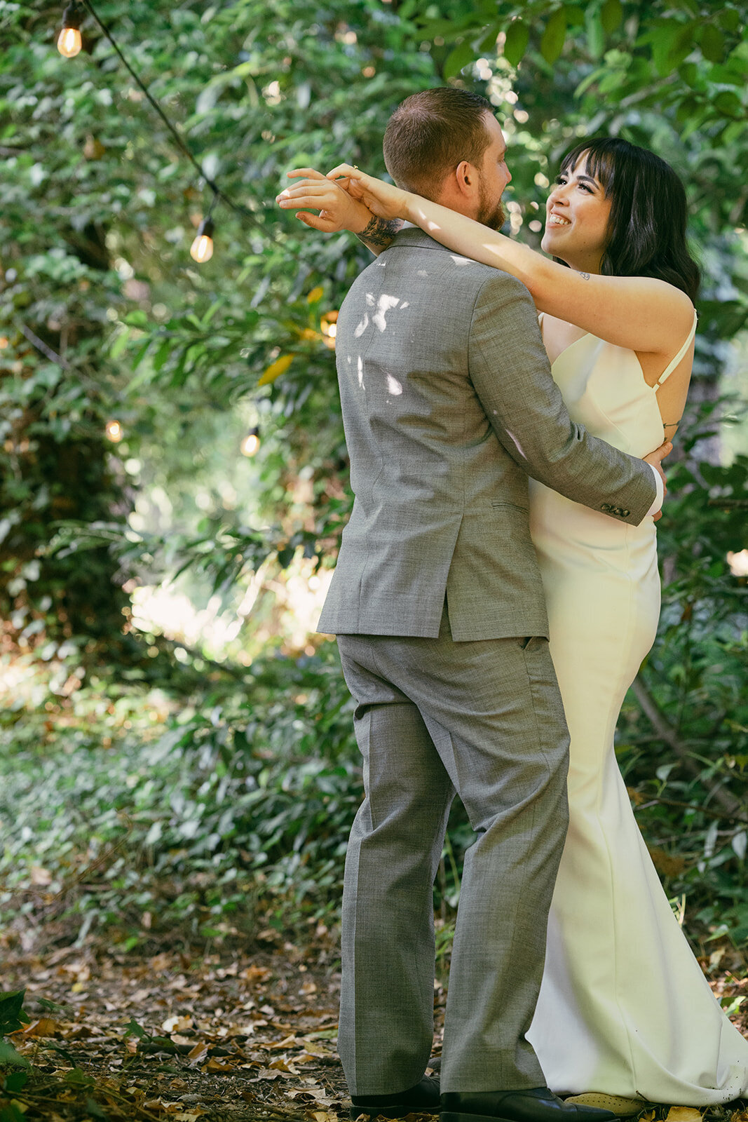 bride-and-groom-dancing-in-the-forest