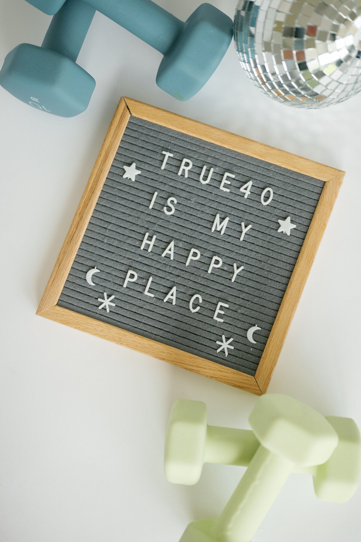 Letterboard that says True40 is my happy place