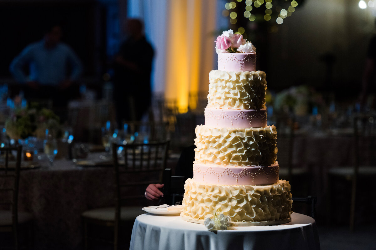 wedding cake on display at event nemacolin resort grand ballroom