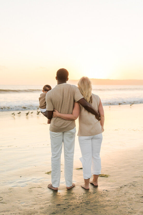 couple-with-baby-watching-Coronado-San-Diego-sunset