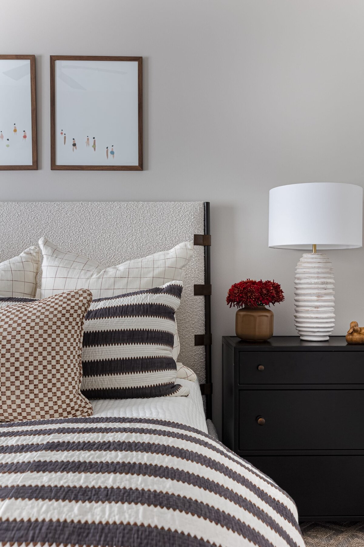 melinda chesson interiors meadowood place bedroom with white sidetable and red flowers