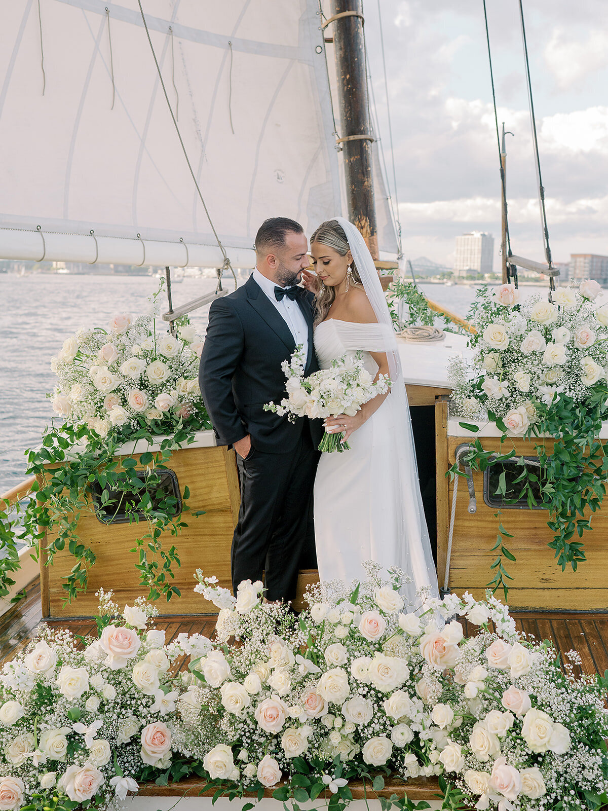 Kate-Murtaugh-Events-sail-boat-yacht-elopement-wedding-planner-Boston-Harbor-babys-breath-white-roses-MA