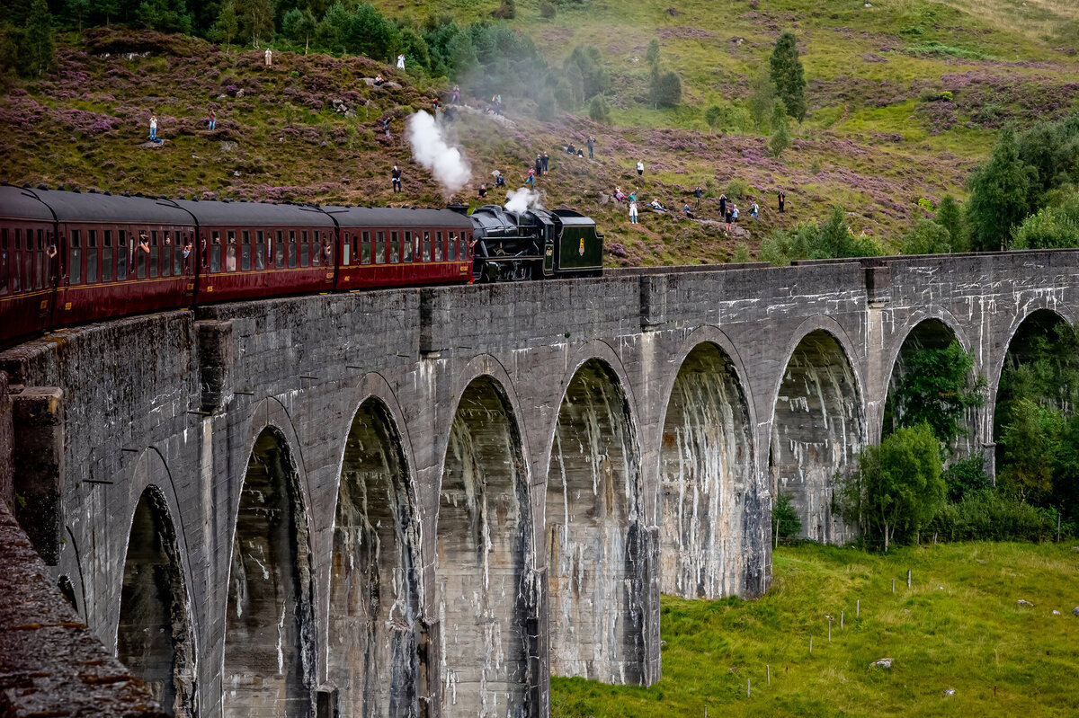 Riding the Jacobite steam train, or the Harry Potter train over the Glenfinnan Viaductin Scotland