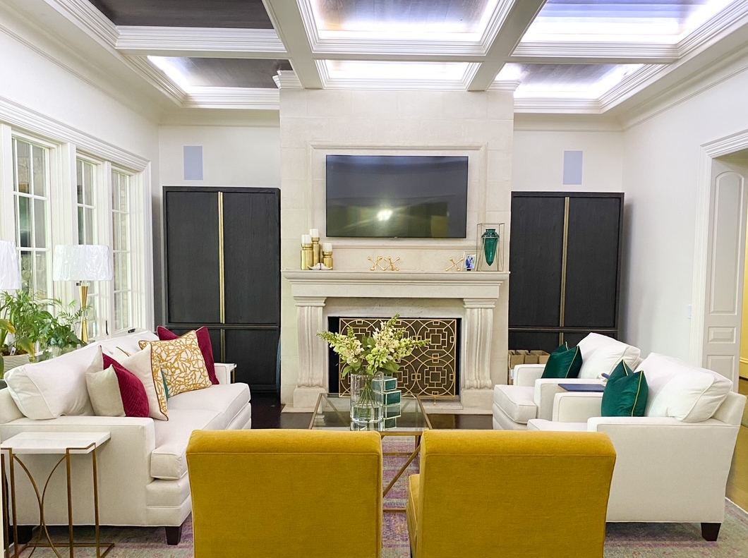 Living room design with yellow chairs