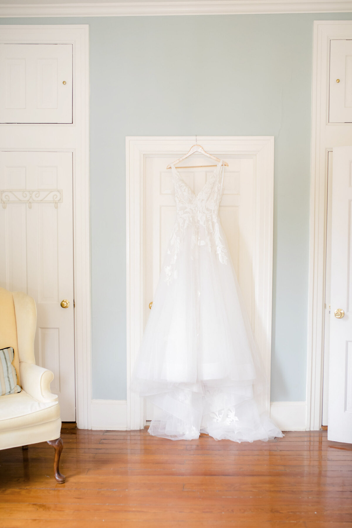 Wedding dress hanging in the bridal suite