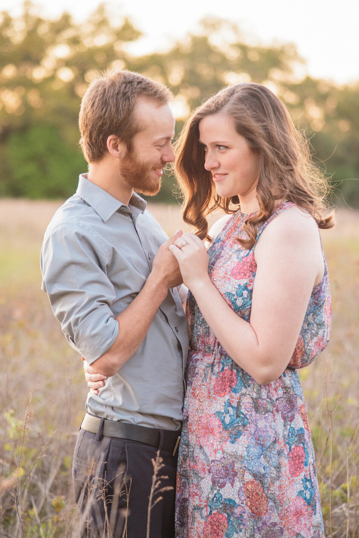 An engaged couple look at each other with an abundance of love in their eyes