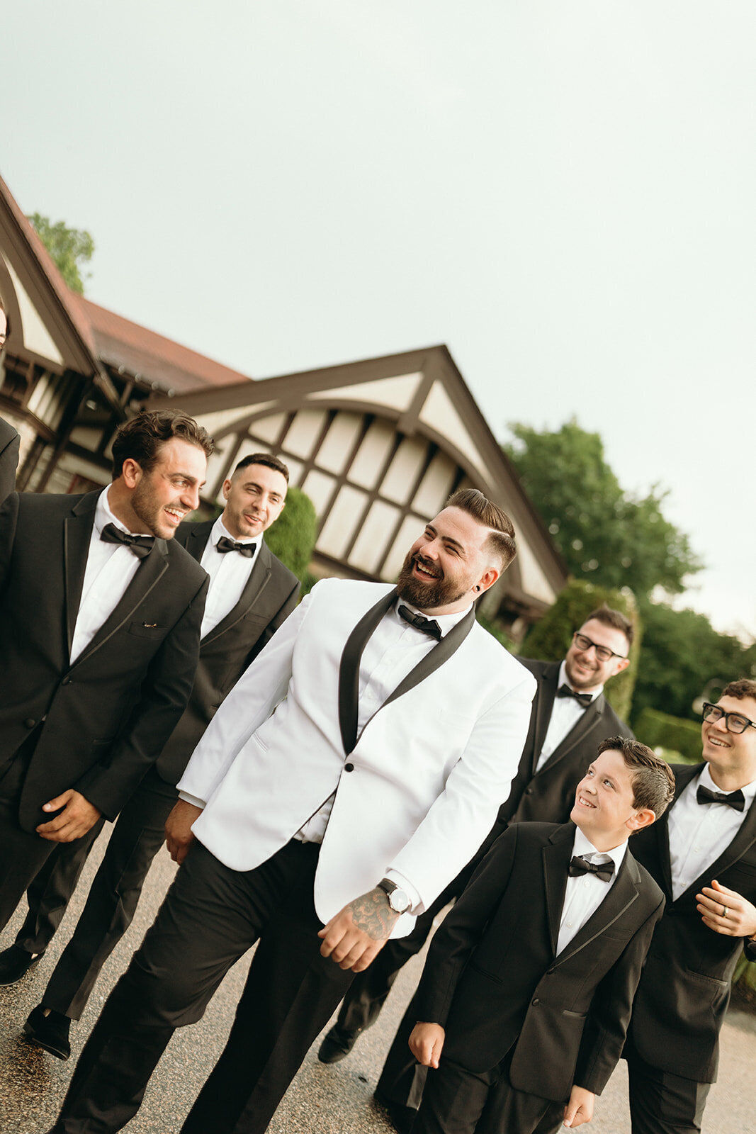 groom-and-groomsmen-photos-at-saint-clements-castle