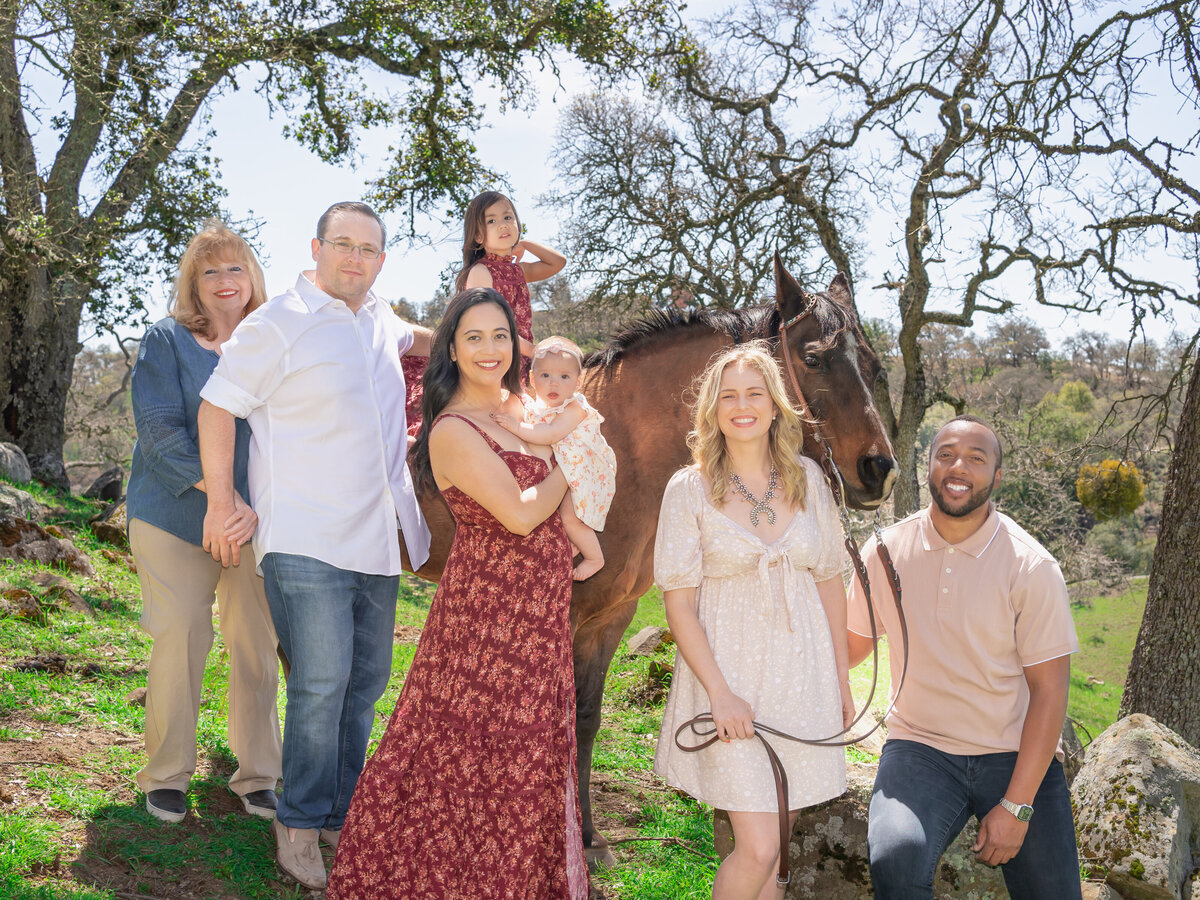 Family picture in Big Sur with horse