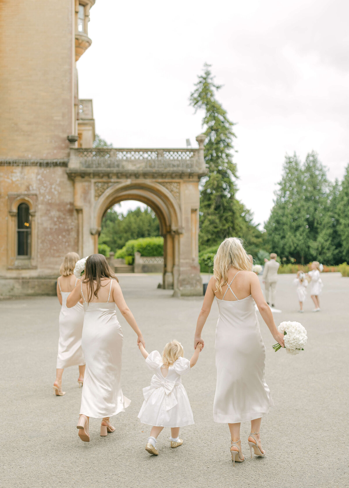 chloe-winstanley-weddings-grittleton-house-bridesmaids-walking