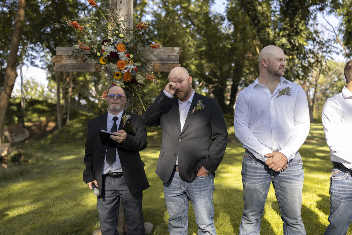 Candid toast by wedding guests