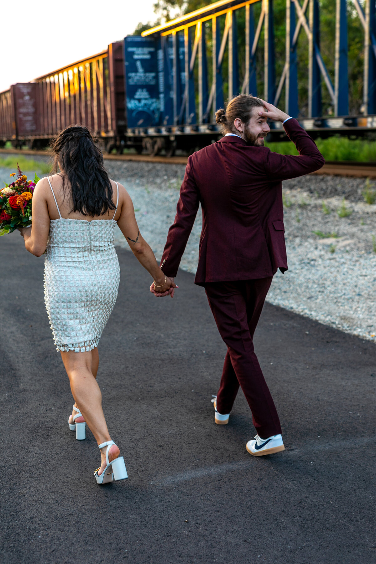 couple-walking-away-by-train