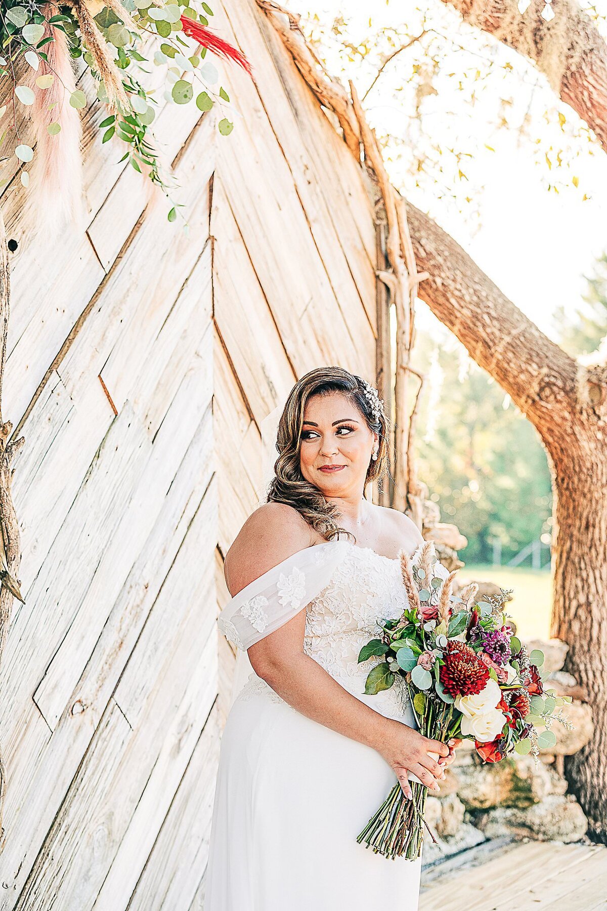 bride with bouquet at Bending Branch Ranch