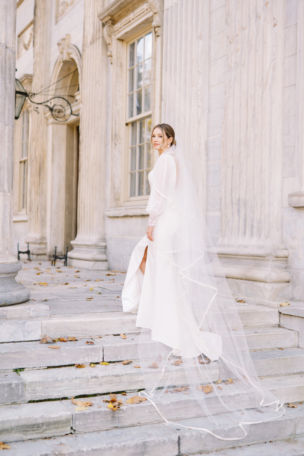 Bridal Portrait with long veil from BHLDN at the First Bank of the United States in Philadelphia, PA
