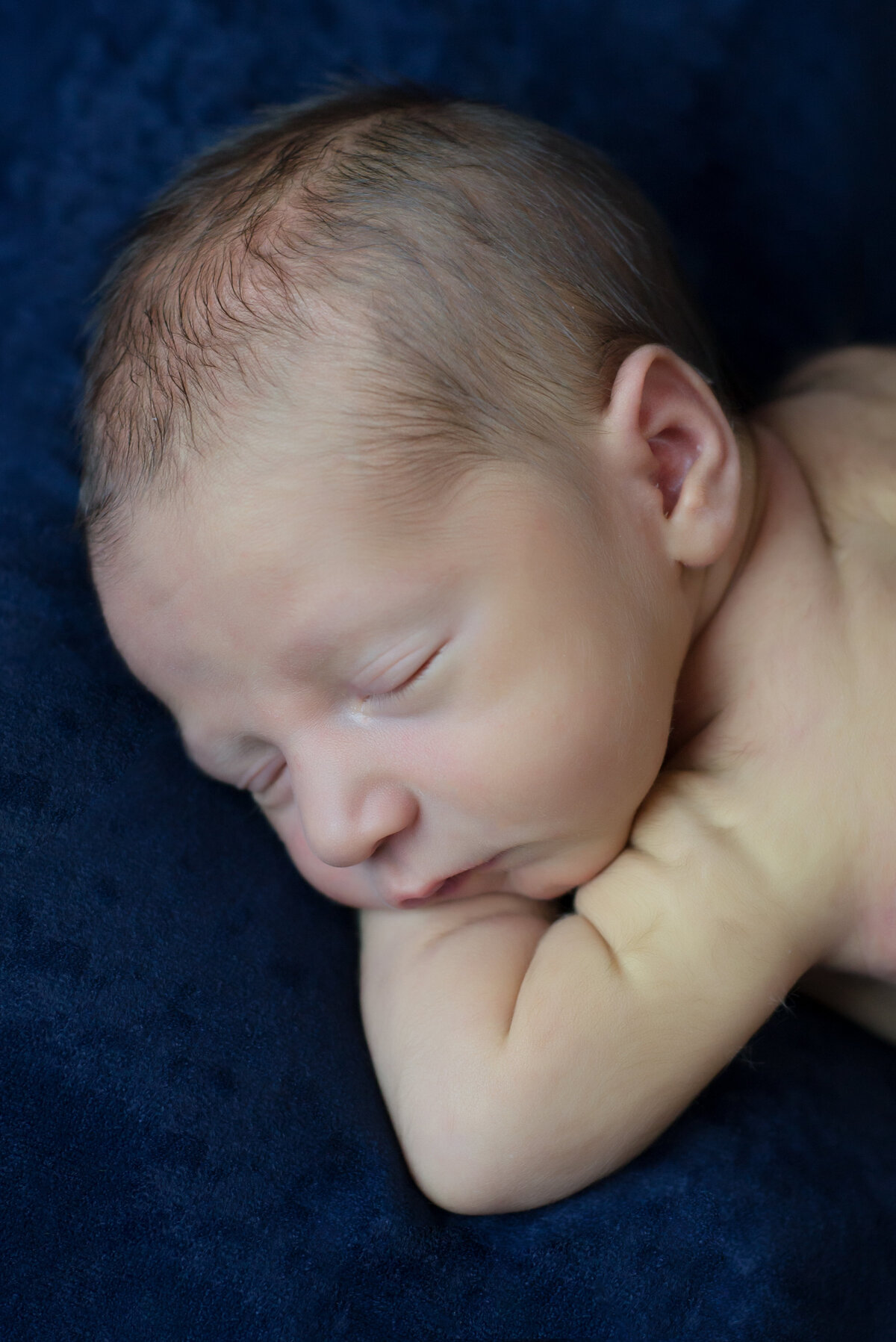 Newborn baby boy close up portrait sleeping in Kennebunk Maine