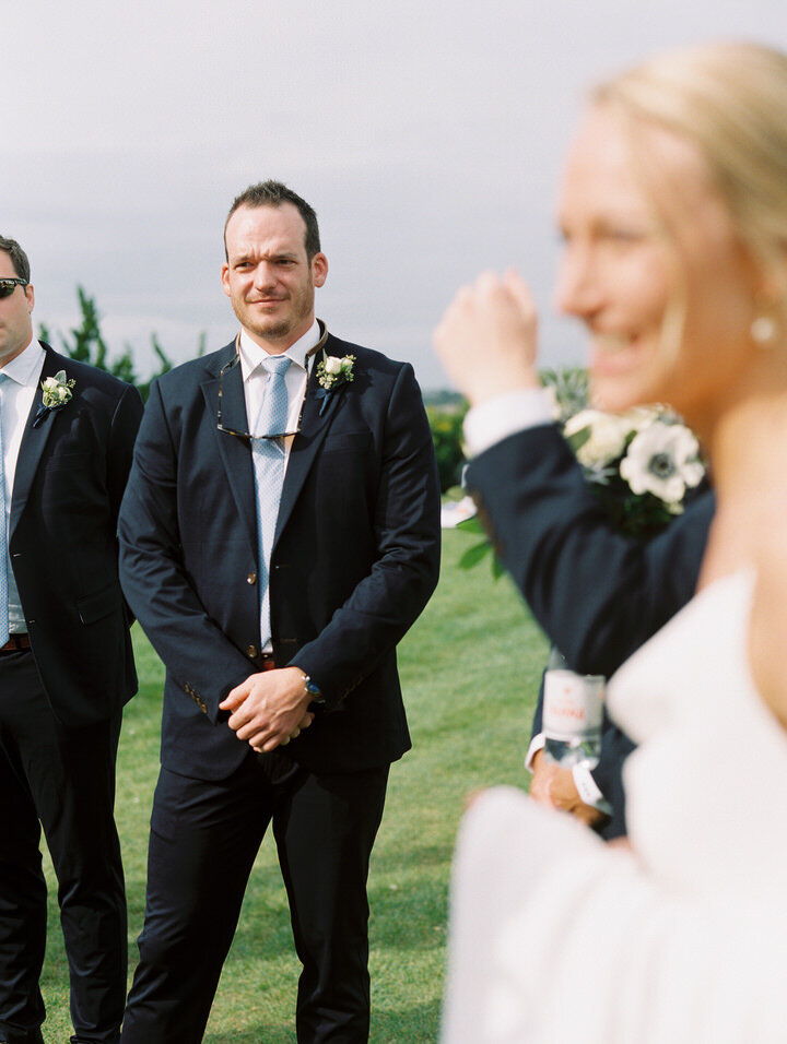 photos of groomsmen for wedding at newport castle hill