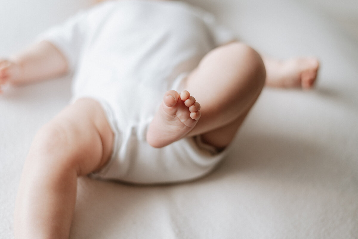 a babys foot in milestone photoshoot in Billingshurst