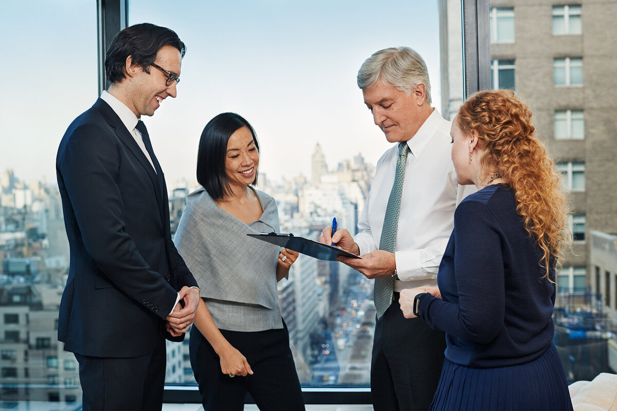Engaging group collaboration among corporate professionals in Cornell Capital Offices, photographed by Ylva Erevall.