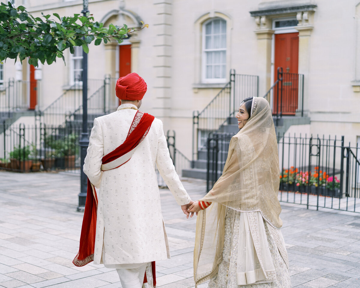Bride and groom at traditional Sikh wedding ceremony