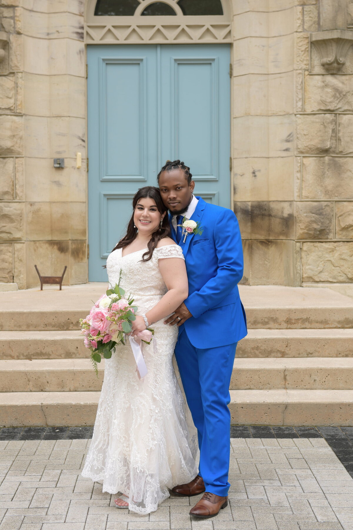 wedding-portrait-bride-groom-wooden-door