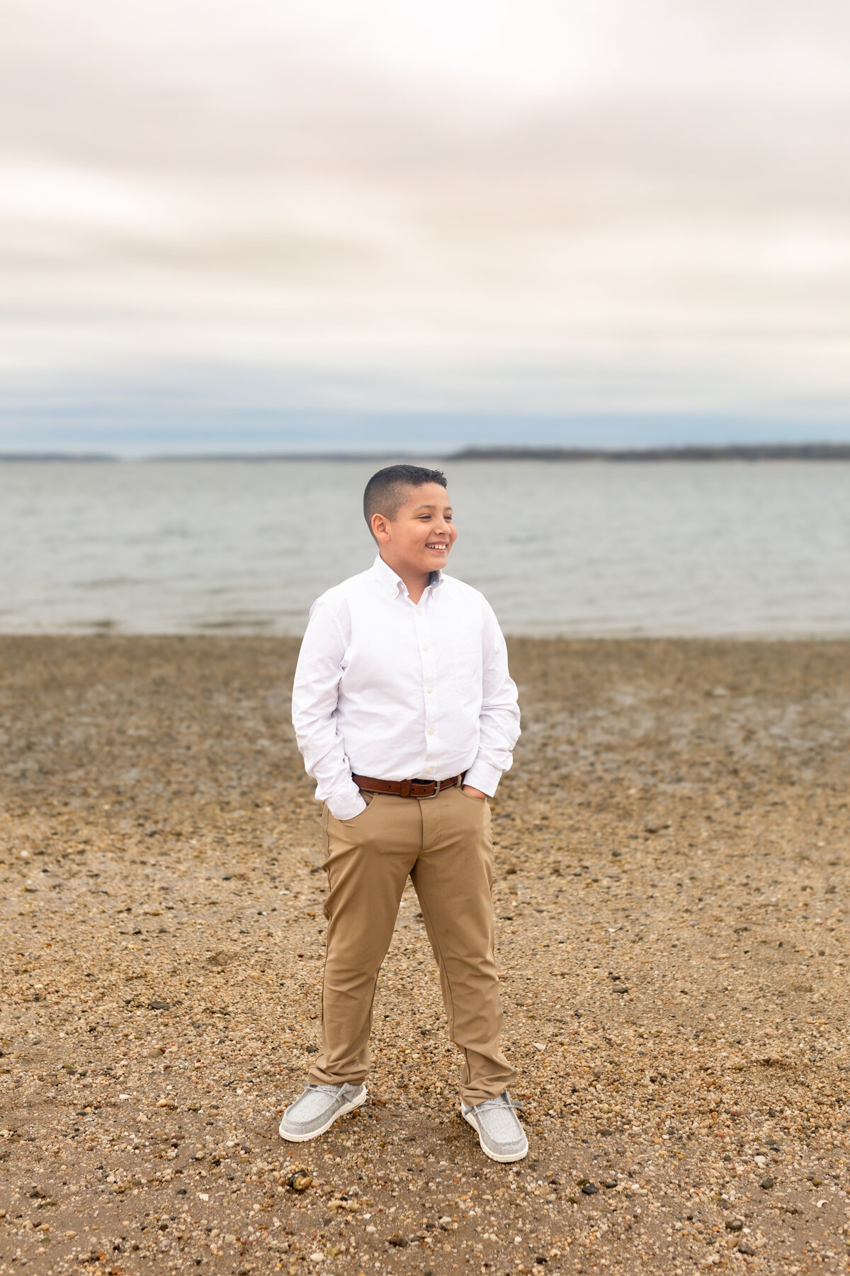 Boy-standing-beach-NY