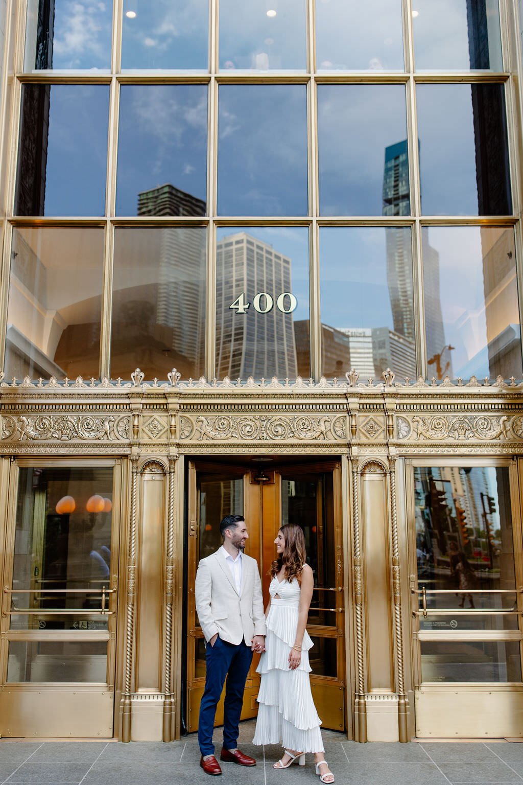 An engagement photography session at The Wrigley Building and North Ave Beach in Chicago, Illinois - 7